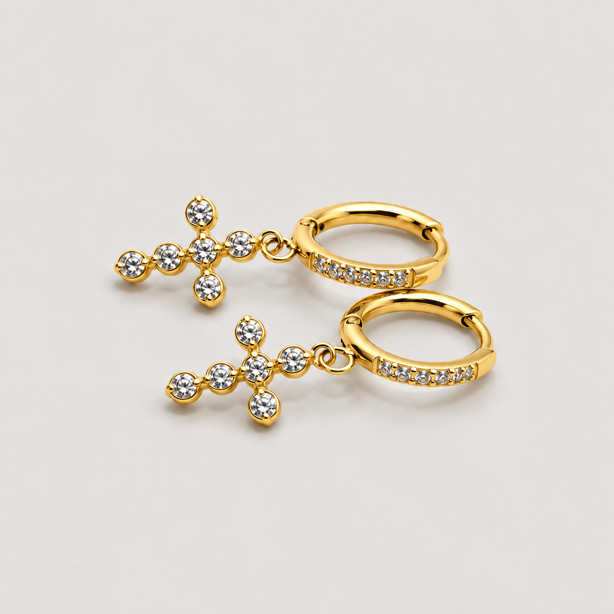 Lumi Cross Hoops — studio product photograph