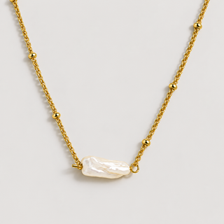 Helios Pearl Necklace — studio product photograph