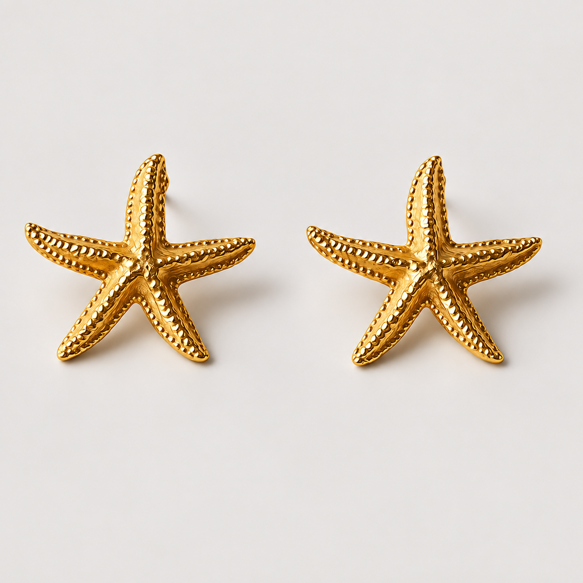 Starfish Earrings — studio product photograph