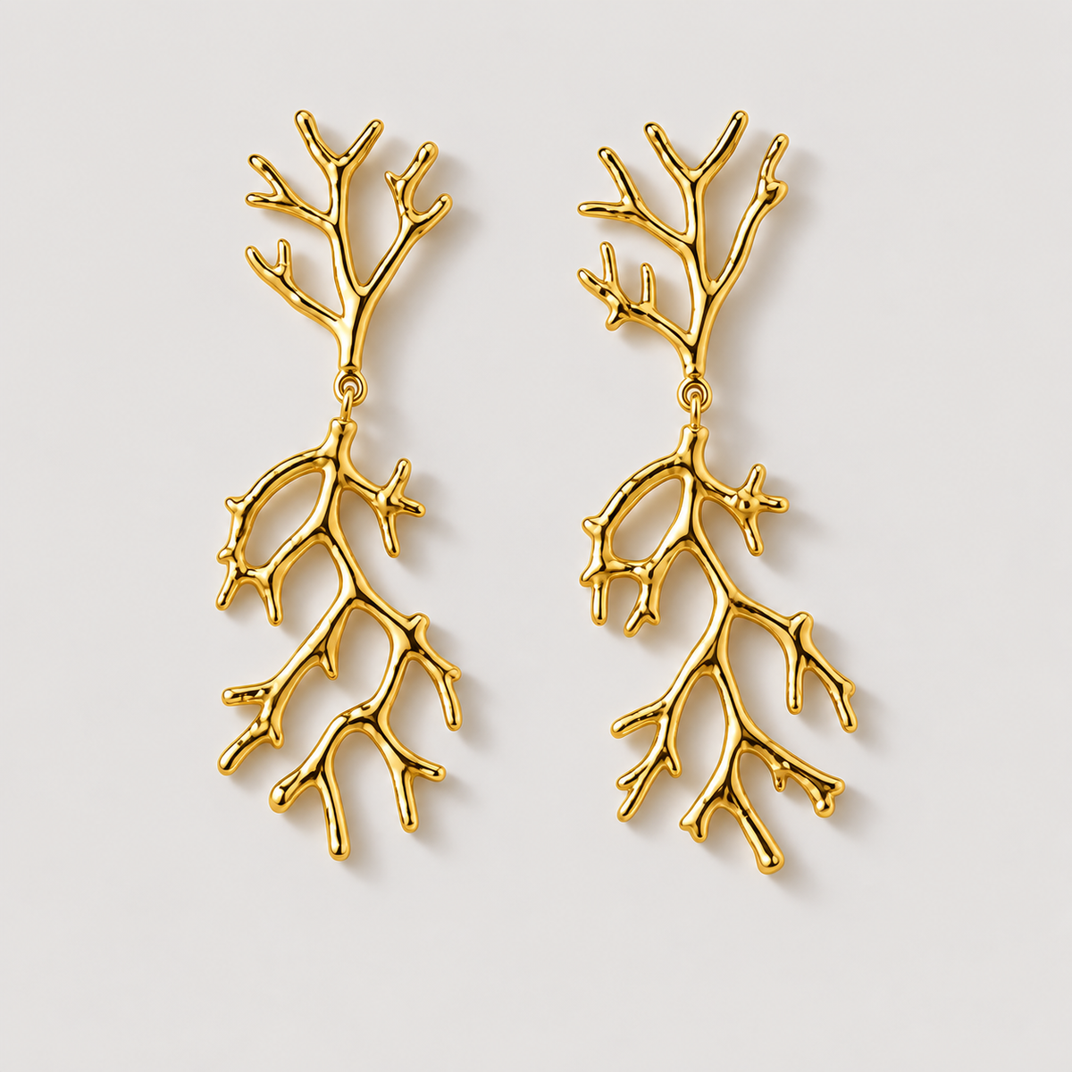 Reef Earrings — studio product photograph