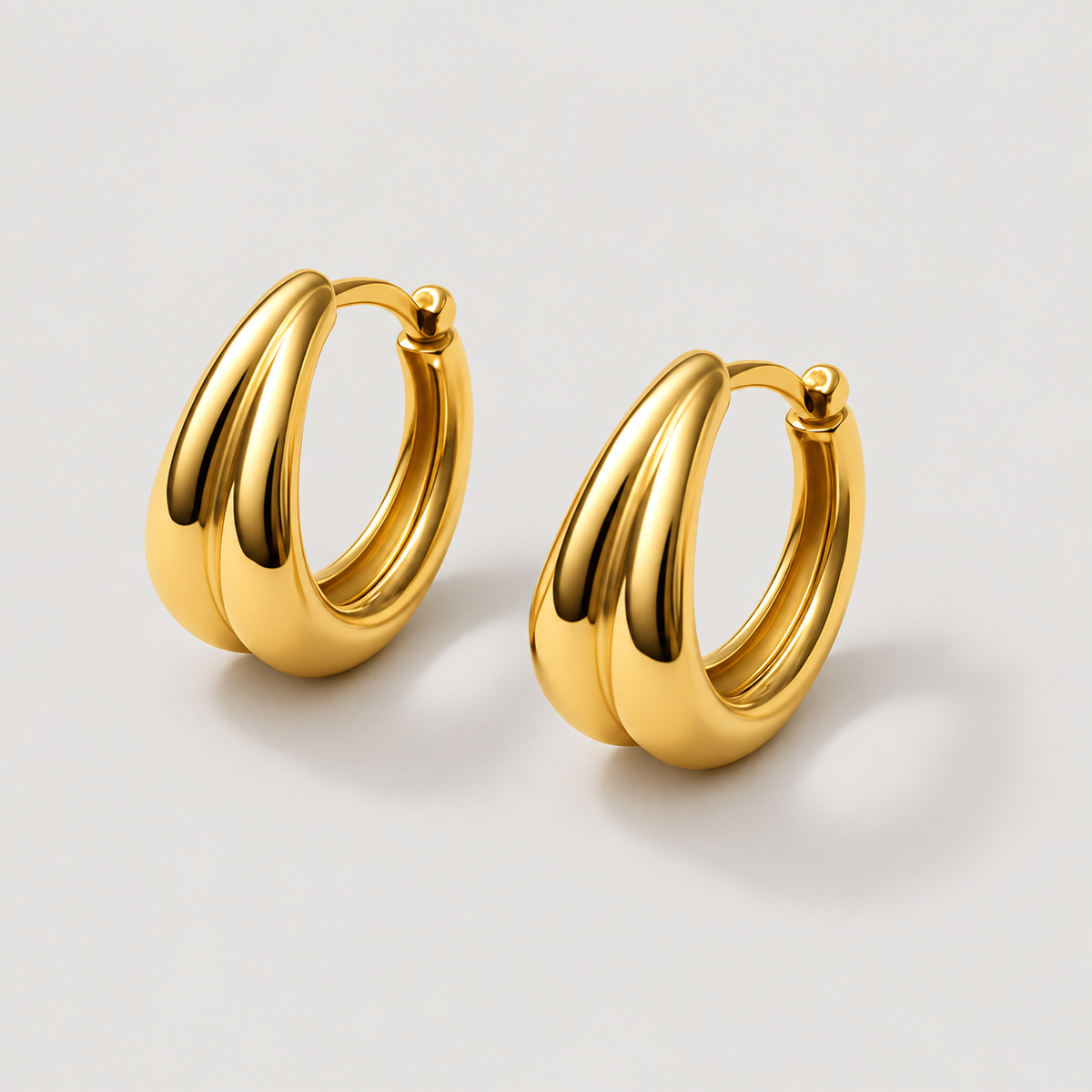 Deya Earrings — studio product photograph
