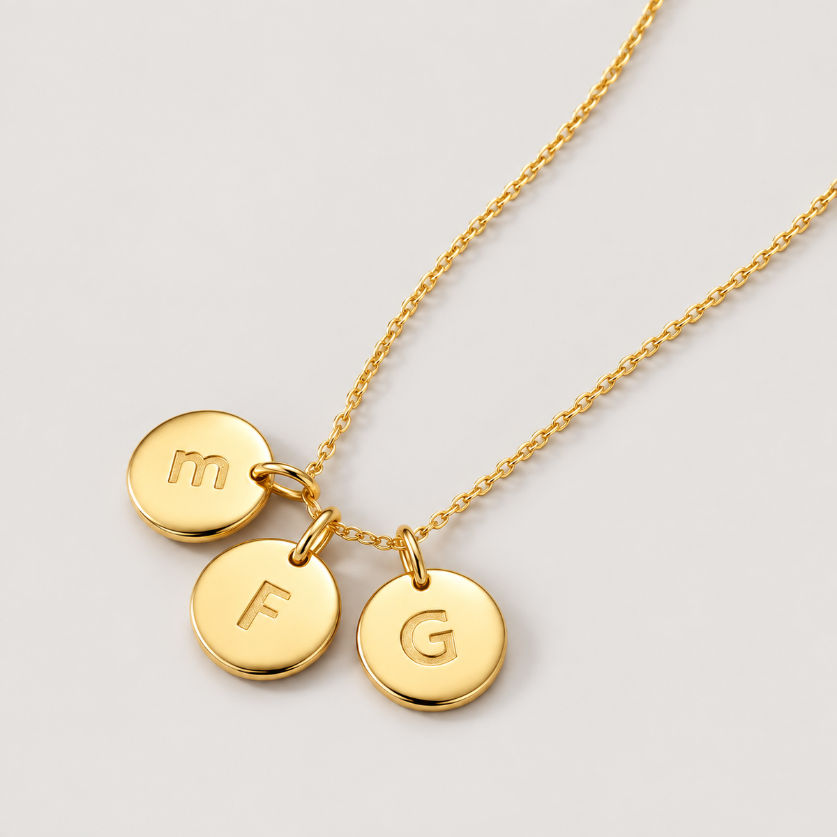 Aura Initial Necklace — studio product photograph